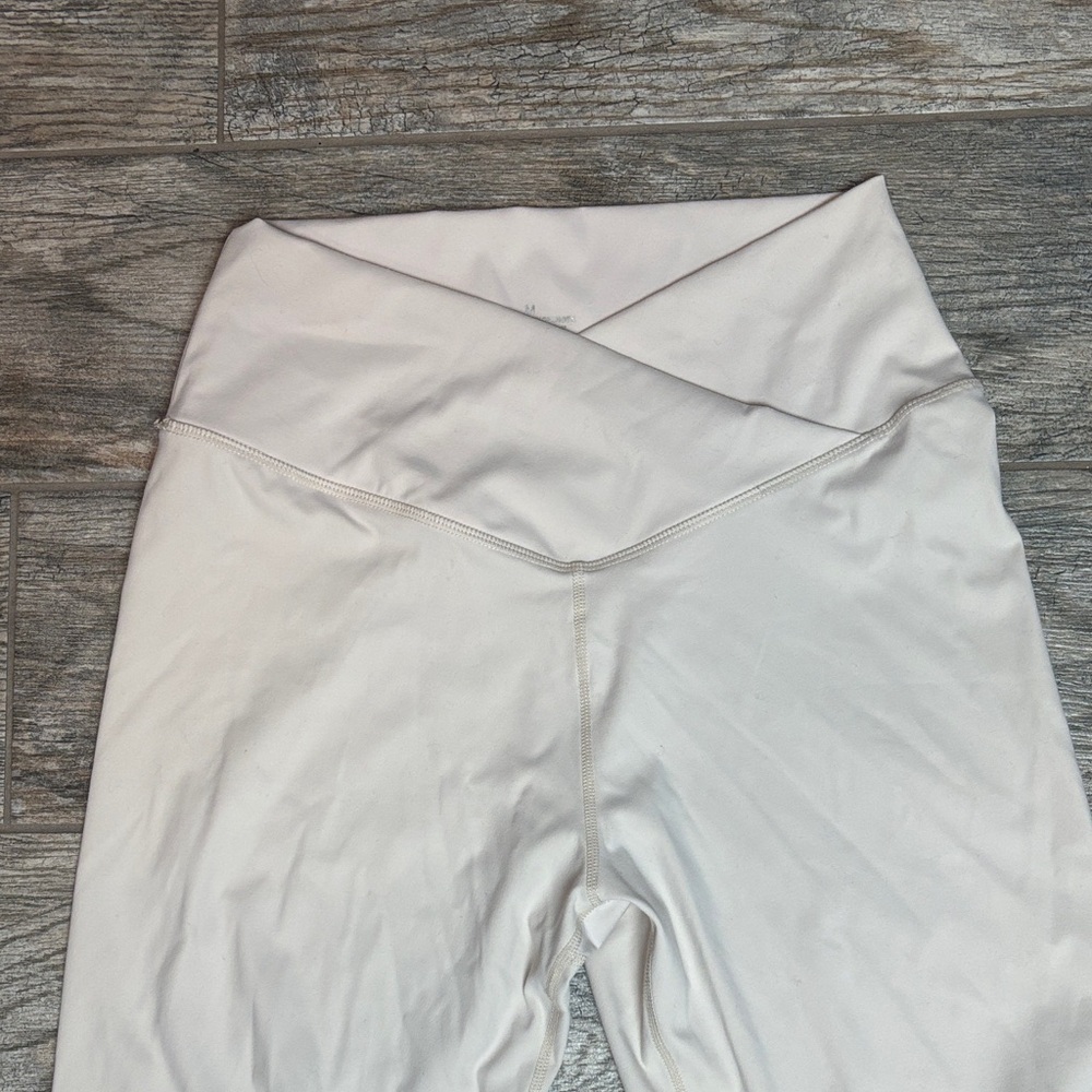 Cream High-Waisted Crossover Flare Leggings